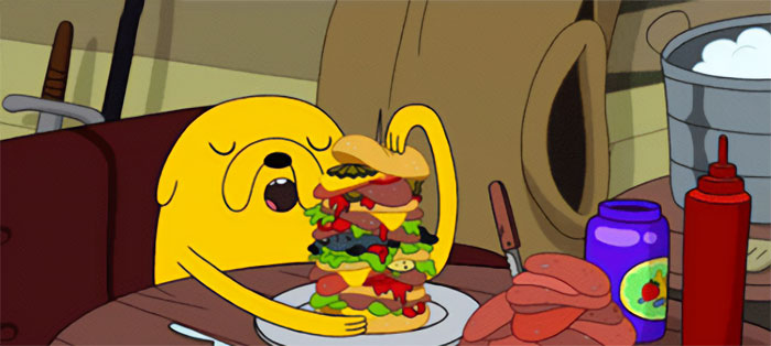 Jake the Dog from Adventure Time enjoying a large sandwich, capturing the wacky spirit of Adventure Time quotes.