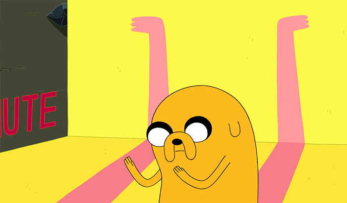 Jake the Dog from Adventure Time looking thoughtfully at his hands, illustrating wacky yet profound adventure time quotes.