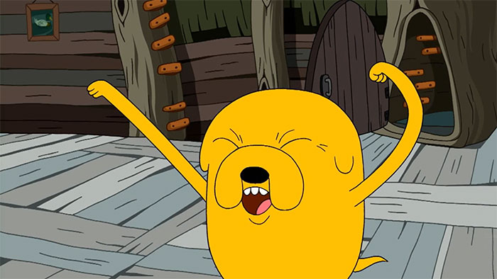 Jake the Dog stretching with eyes closed inside a wooden cabin, showcasing wacky Adventure Time quotes.
