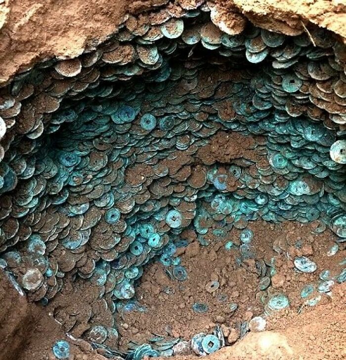 Coins Made Of Copper Were Found Within The Burial Site Of A Chinese Tomb Dating Back To The Tang Dynasty, Which Existed Between 618 And 920 Ad