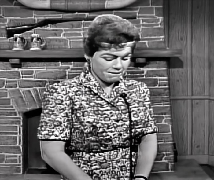 Woman crying and looking down 