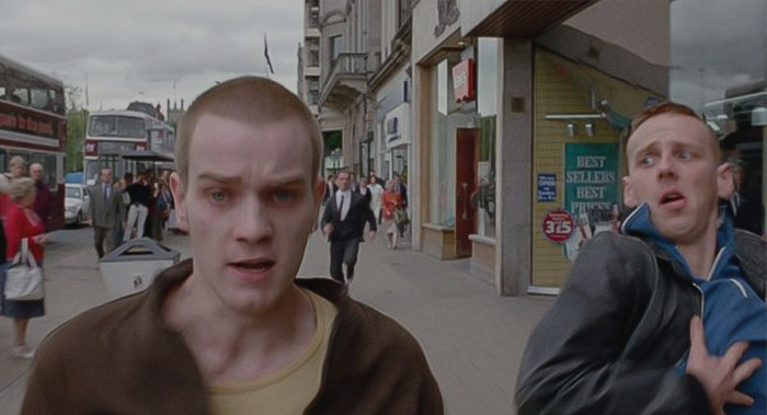 Mark wearing brown jacket 