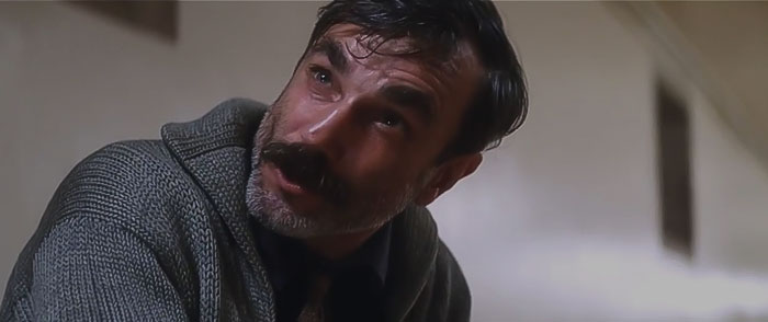 Daniel wearing grey sweater 