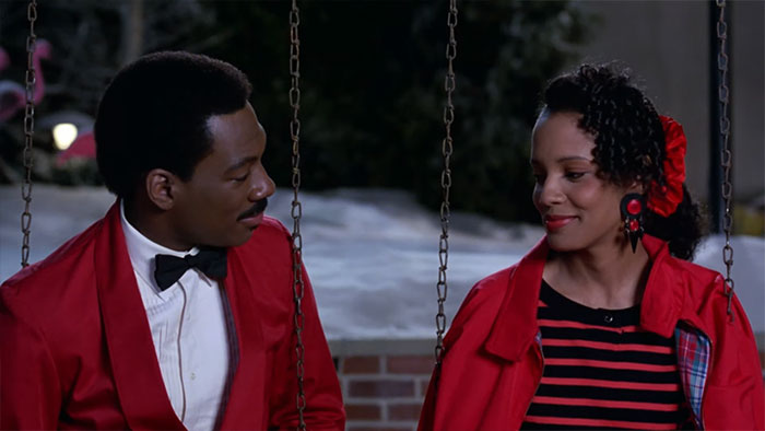 Scene from Coming To America movie featuring a romantic moment, perfect for wedding movies celebrating love.