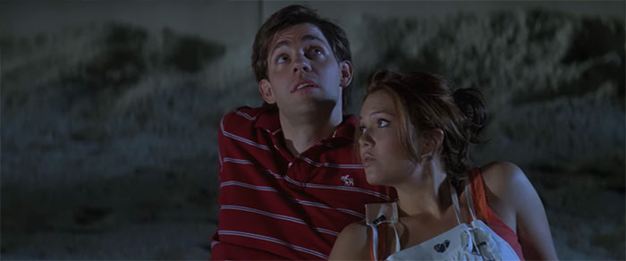 Scene from Licence To Wed movie featuring a couple sharing a quiet moment, highlighting wedding movies celebrating love.