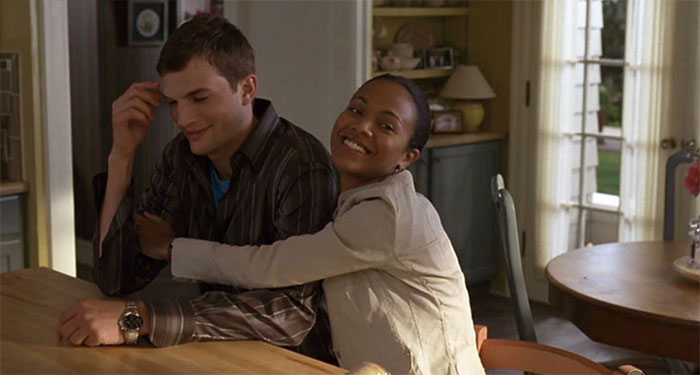 Couple sharing a warm moment in a Guess Who movie scene, perfect for wedding movies celebrating love.