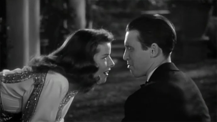 Classic black and white scene from The Philadelphia Story, a beloved wedding movie celebrating love and romance.