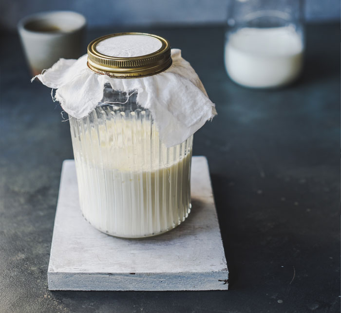 Clear glass jar with white liquid