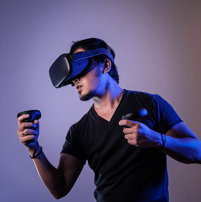 Person playing with virtual reality headsets