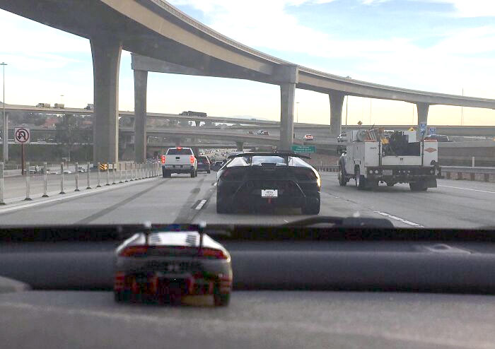 The Car I Was Behind Was Almost The Same As The Toy One I Keep On My Dash