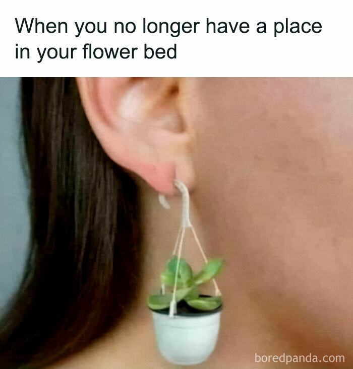 Earring shaped like a small potted plant, worn on an ear.