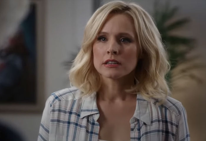 Eleanor wearing white shirt 