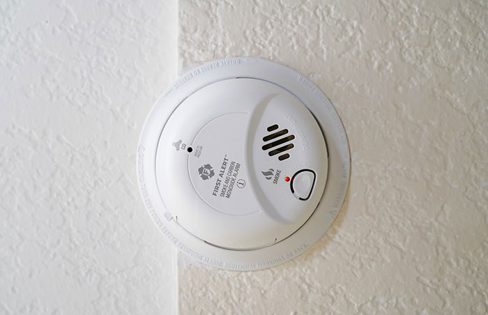 Carbon monoxide mounted on white wall