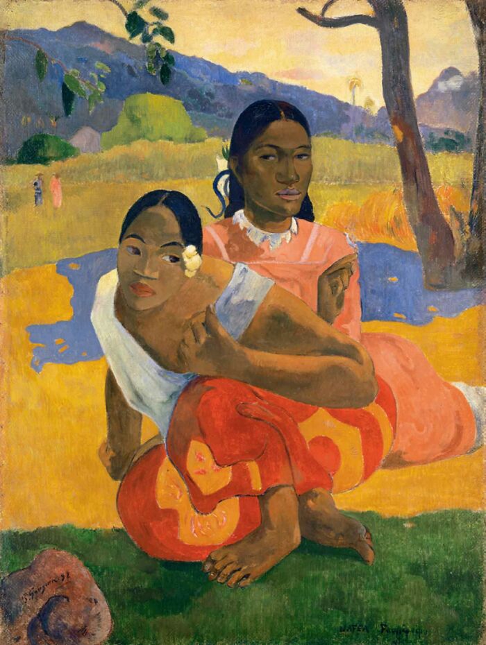 When Will You Marry? by Paul Gauguin, 1892, two Tahitian women sit close to each other on the ground in nature
