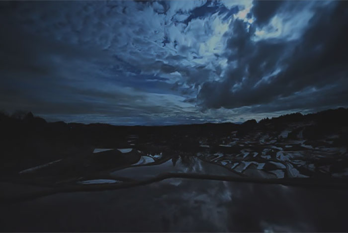 Image from Ducktails - Deck Observatory music video - water and clouds in dark atmosphere