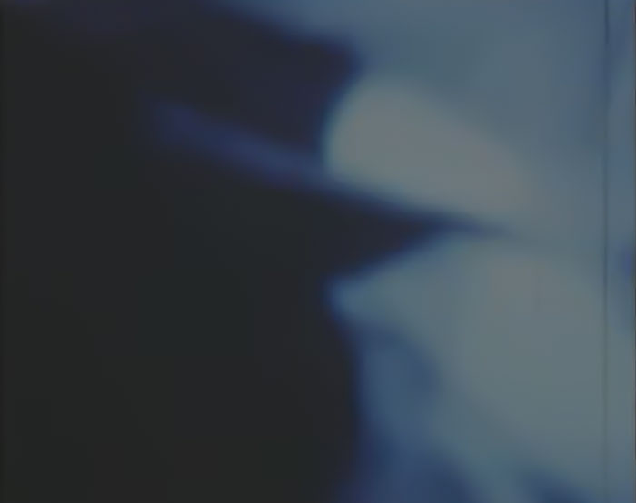 Abstract dark blue and white image from HOLY OTHER - WE OVER music video