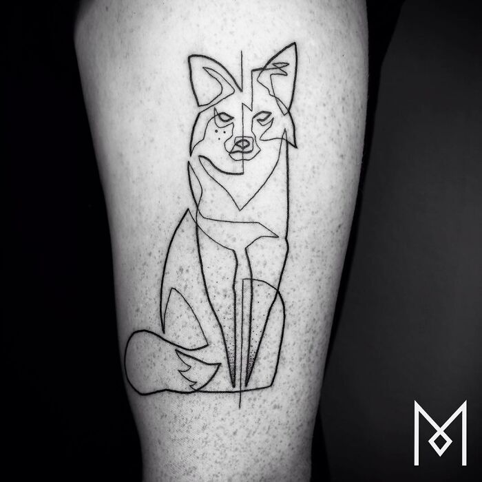 Single line tattoo of a stylized fox design on an arm.