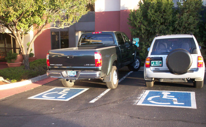 Man Shouting At A Person For Legally Using A Handicapped Parking Spot Gets Instant Karma From A Nearby Cop