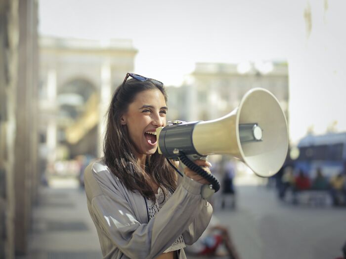Woman Screaming Into A Megaphone 