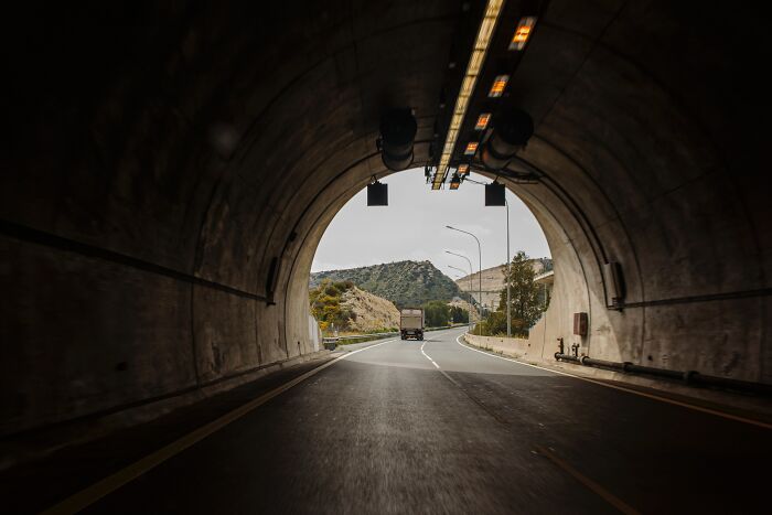 the ending of a road through the Tunnel 
