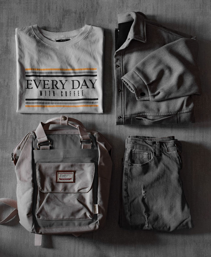 Gray clothes with bag on table