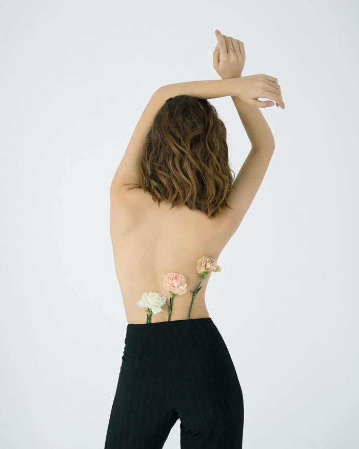 Woman with black pants standing