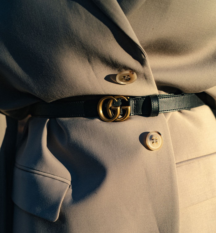 Woman wearing black small belt