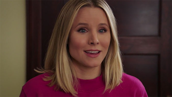 Eleanor wearing pink sweater 