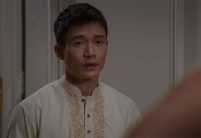 Jason wearing a white shirt 