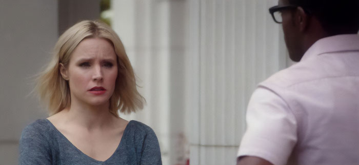 Eleanor wearing grey sweater 