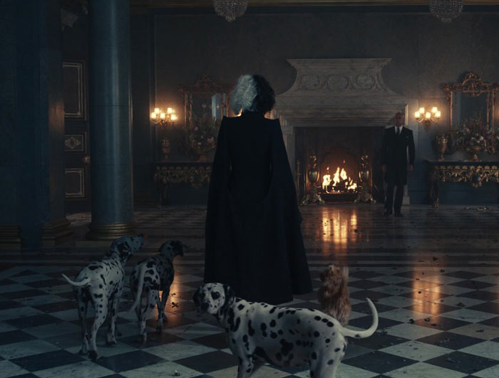 Cruella with dalmatians