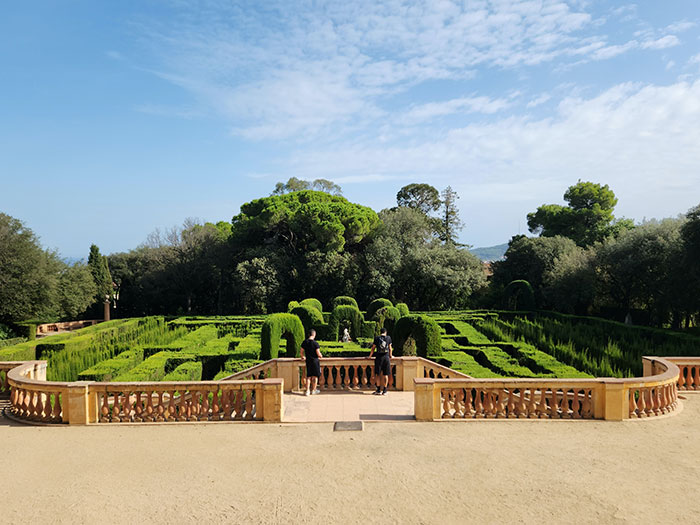 Persons walking in Secret Gardens in Horta, Barcelona, Spain