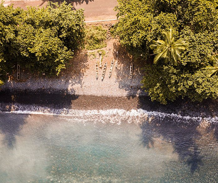 Land with boats near sea in São Tomé and Príncipe