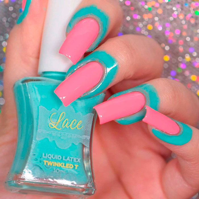 an arm with pink nails holding the bottle of a peel-off nail polish “Barrier”