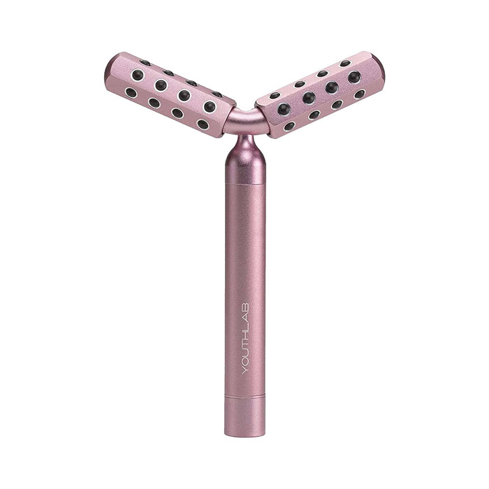 a pink roller for a face