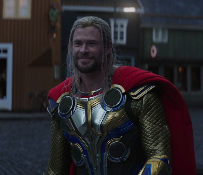 Chris Hemsworth happy and looking straight 