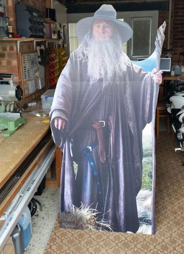 Cutout of a wizard figure in a workshop setting, illustrating a weird rule a guest might follow at someone's house.