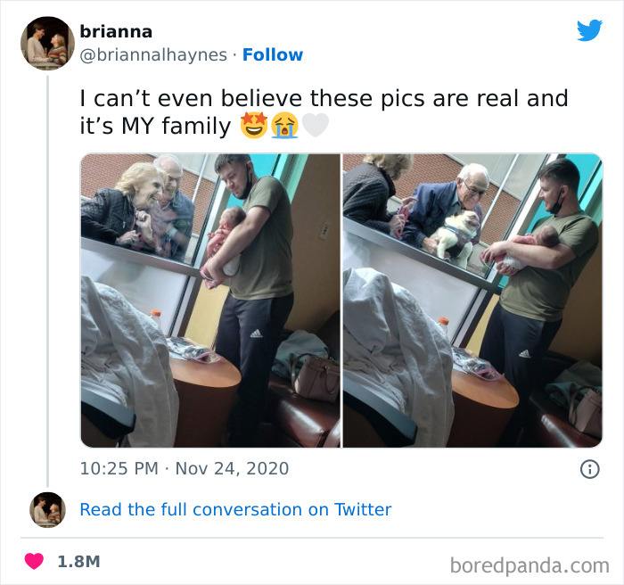 Man holding baby by window, family members looking in, capturing a funny meme moment.