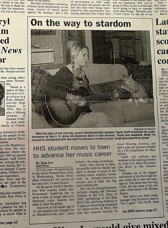 My Library Is Displaying An Archive From Our Local Newspaper Predicting A New High Schooler In Town, Taylor Swift, Will Rise To Stardom