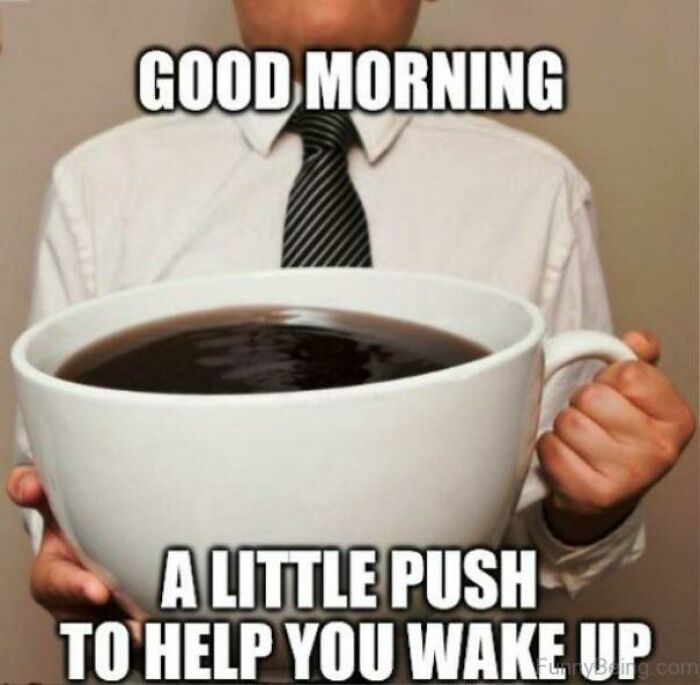 Person holding gigantic coffee cup with text "Good Morning - A Little Push To Help You Wake Up" to start Monday.