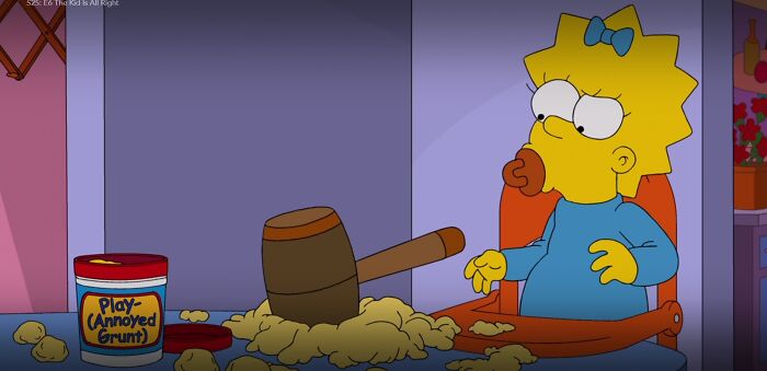 In The Simpsons, Season 25, Episode 6, Maggie Is Seen Playing With 'Play-Annoyed Grunt'. Annoyed Grunt Is The How Homer's Catch-Phrase, D'oh, Is Represented In The Show's Scripts
