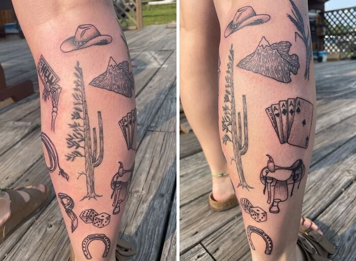 Patchwork tattoo leg with cowboy hat, cactus, horseshoe, cards, and mountain designs on a wooden deck.
