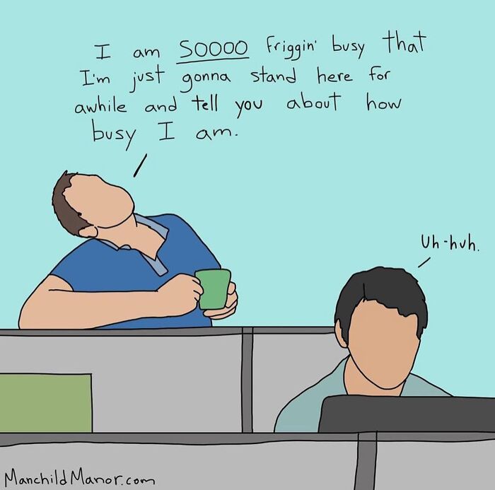 Cartoon showing a man humorously claiming to be very busy while talking to a coworker in an office setting.