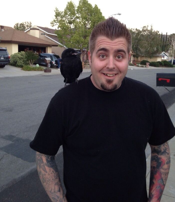 Man and crow on his shoulder