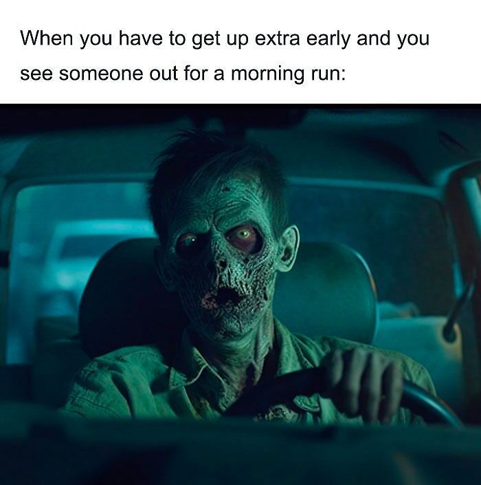 Zombie driving in dim light, captioned with a funny morning meme about waking up early.