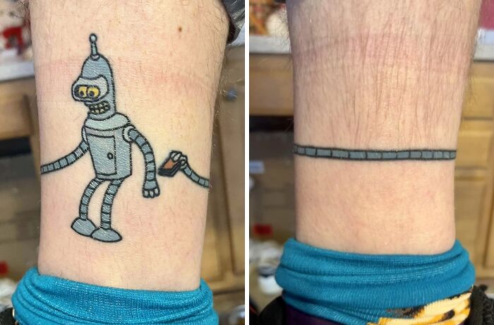 Pop culture tattoo featuring a cartoon robot design on a person's arm, showing front and side views.