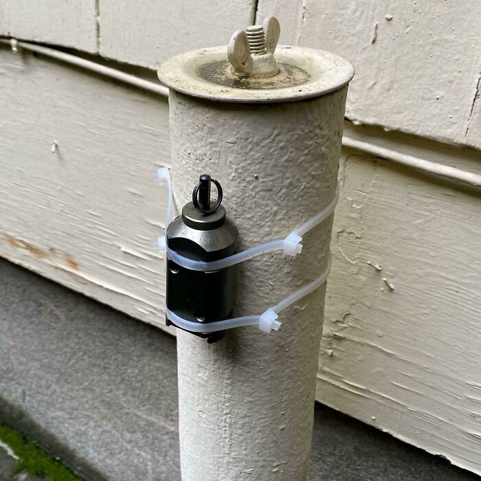 Small Metal Thing Attached To Pipe. Looks Like A Pressure Valve At The Top?