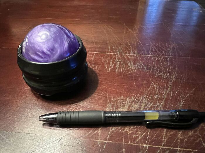 Fun Plastic Ball Captive In A Strange Plastic Enclosure; Ball Rotates Pretty Freely, Hole In Base Of Enclosure. Found In Garage