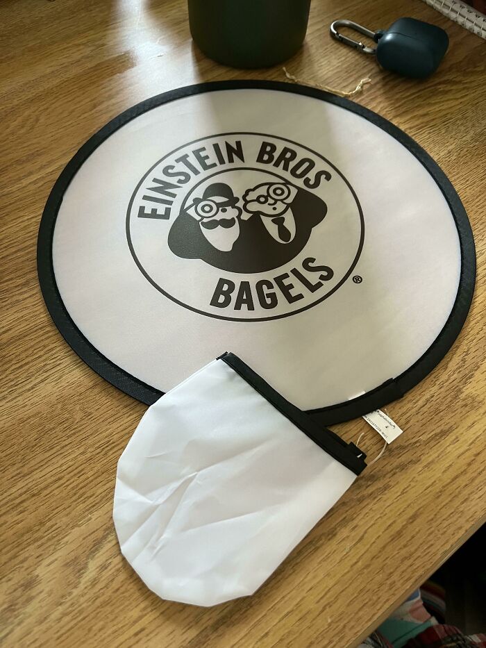 What Is This Disc Thing I Was Just Handed With My Bagel? About 10 Inches In Diameter. Pouch Is Too Small To Hold A Can. Tag Says “Dist. By Primeline (Alphabroder) Cpsiatracking.com” I Went To The Url, And It Doesn’t Exist. Searched Those Companies’ Products And Found Nothing Relevant