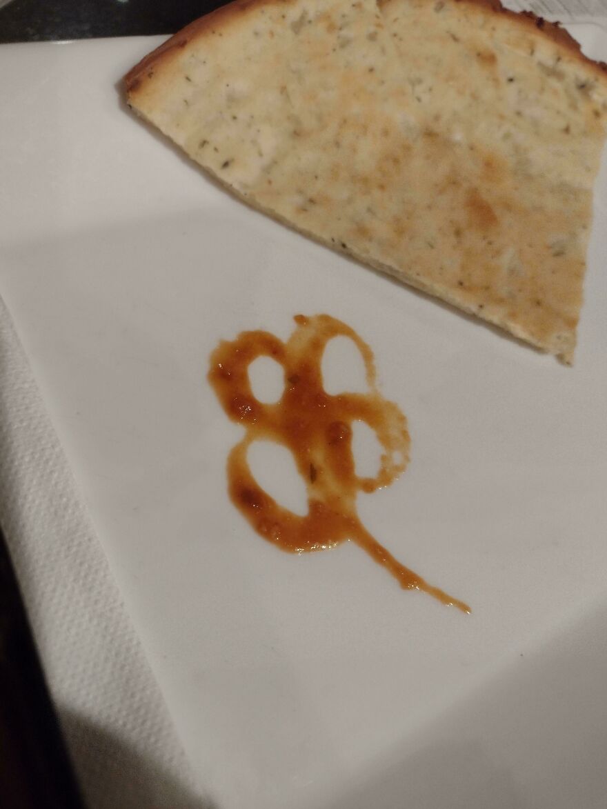 My Husband Forgot To Get Me Flowers For Our Anniversary, So He Drew One Using Tomato Sauce At The Restaurant We Went To.